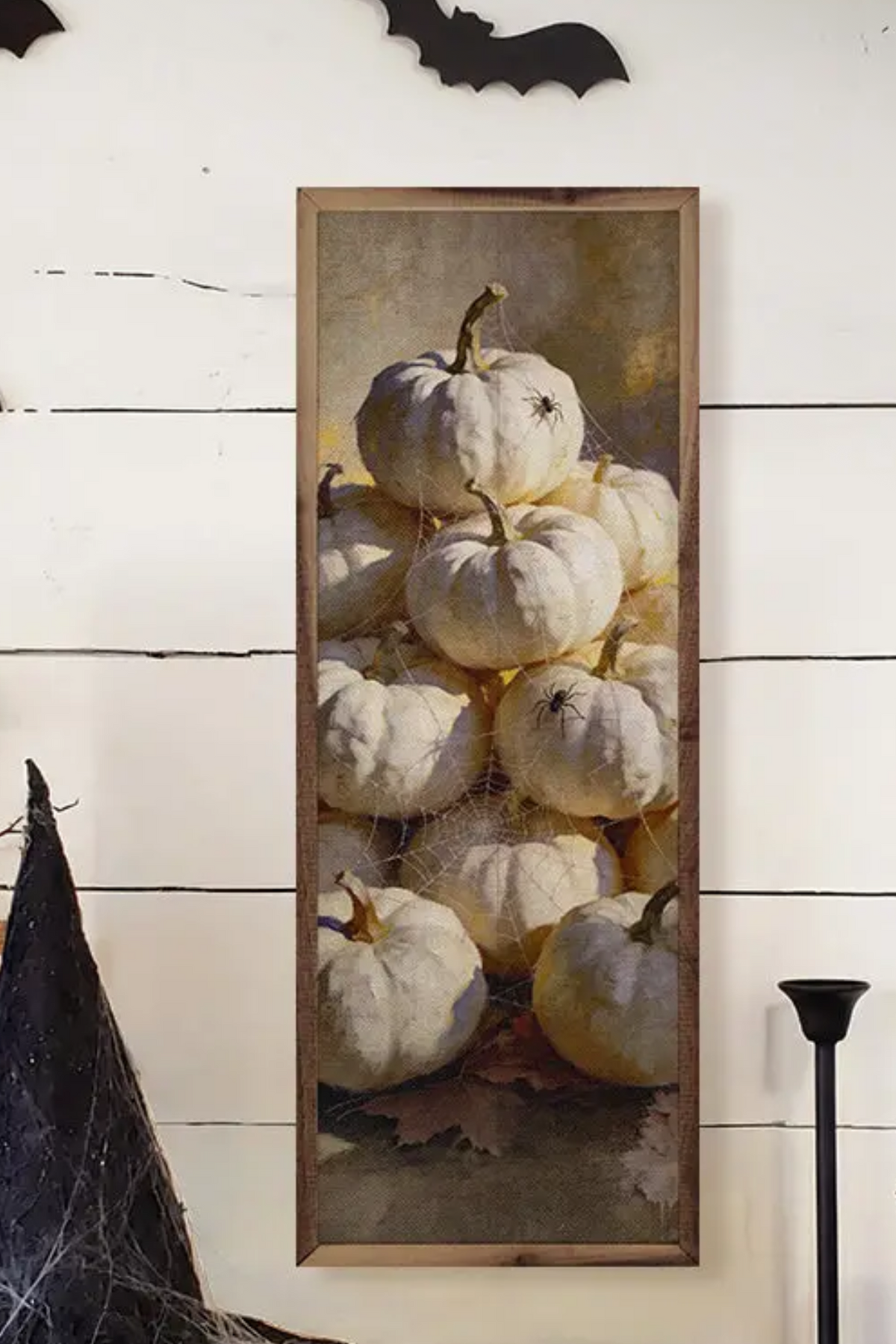 Spiders across pumpkins